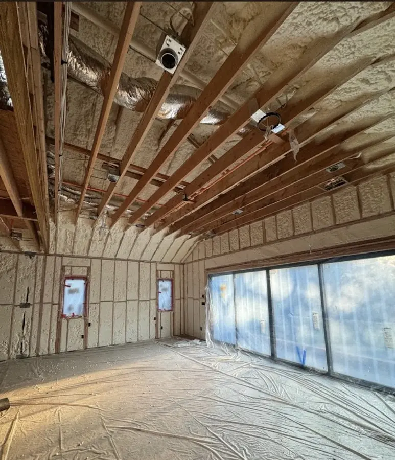 Interior walls and ceiling insulated with spray foam during new construction in Evansville
